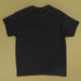 Black t-shirt on a beige background