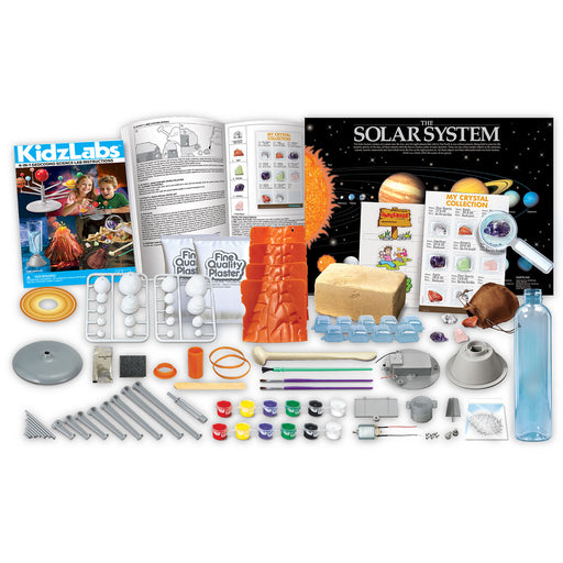 Educational science kit for creating models of the solar system on a white background