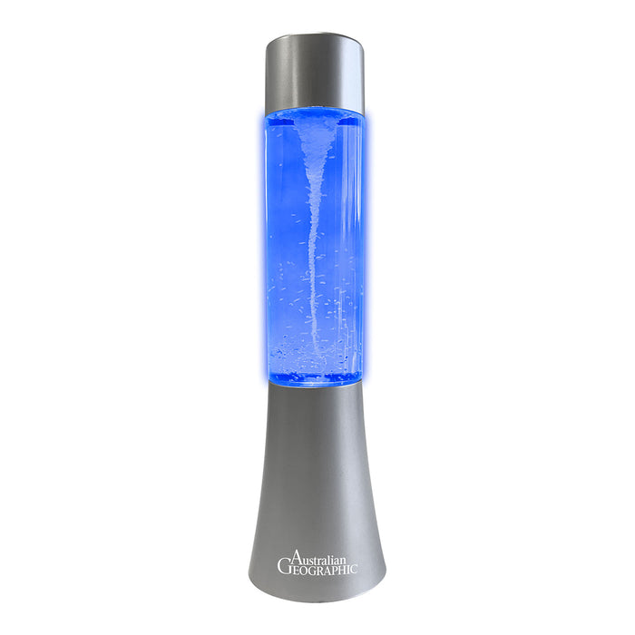 Lava lamp with blue liquid and silver top and base on a white background