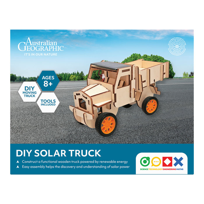 Australian Geographic DIY solar truck kit packaging on a road with trees in the background
