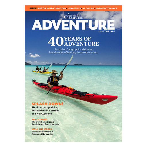 Front cover of the Australian Geographic Adventure magazine featuring a kayaker in a red kayak on turquoise water, with large white title text and orange and blue accents.
