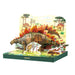 Dinosaur-themed educational toy with pop-up elements on a white background