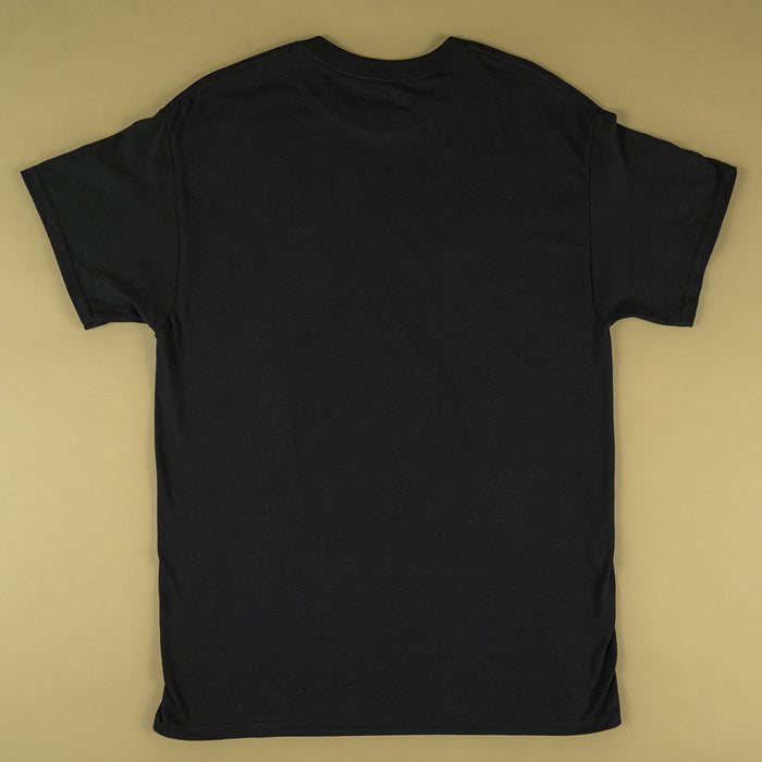 A plain black short-sleeve t-shirt laid flat against a solid beige background, showing the back view.