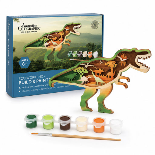 Australian Geographic Eco Workshop Build & Paint dinosaur activity kit, featuring a wooden T-rex model with painted and printed internal dinosaur details, shown with its blue retail box and paint pots on a white background.