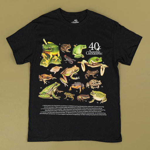 Black t-shirt with frog illustrations and 'Australian Geographic' branding on a beige background