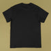 Black t-shirt on a beige background