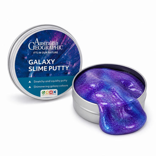 Australian Geographic Galaxy Slime Putty in a round silver tin, shown with one tin closed displaying the label and the other open with the purple-blue glitter slime spilling out on a white background.