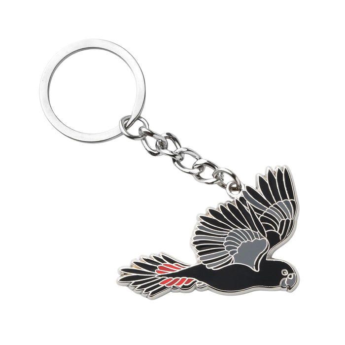 Keychain with a black cockatoo design on a white background