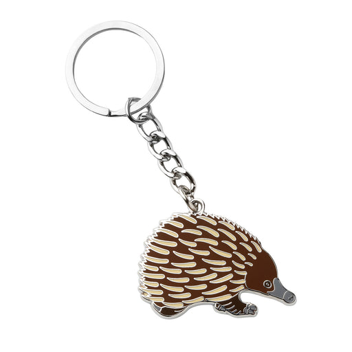 Keychain shaped like a echidna on a white background