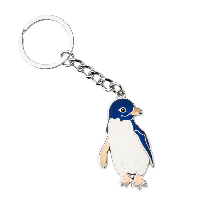 Penguin-shaped keychain on a white background