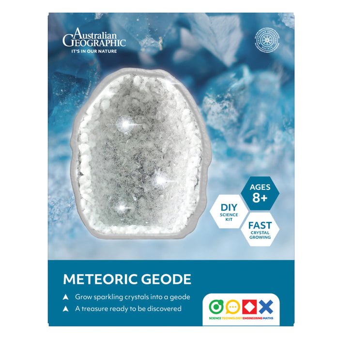 Australian Geographic DIY Science Kit: Meteoric Geode package. The packaging features a blue icy background with a clear plastic shell containing white crystalline powder, with text indicating it is for ages 8+ and fast crystal growing.