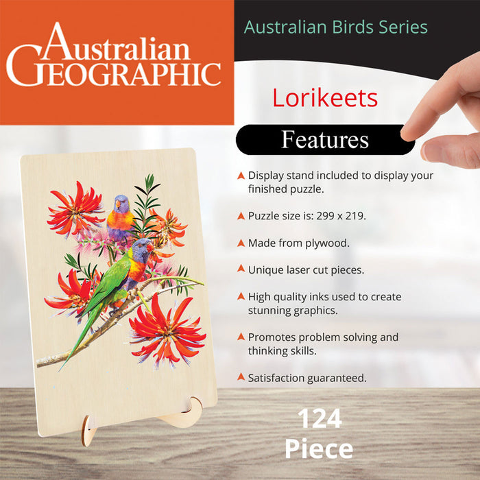 Australian Geographic Lorikeets wooden puzzle in a landscape stand, featuring a colorful illustration of a lorikeet and red flowers. The image includes a hand pointing to the right, a 'Features' list, and the text '124 Piece' on a light background.