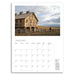 Calendar with a January layout featuring a wooden barn and landscape.