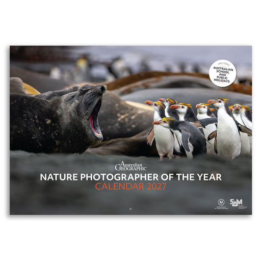 Australia Geographic Nature Photographer of the Year Calendar 2027, featuring a wildlife photograph of a seal and gentoo penguins on a white background.