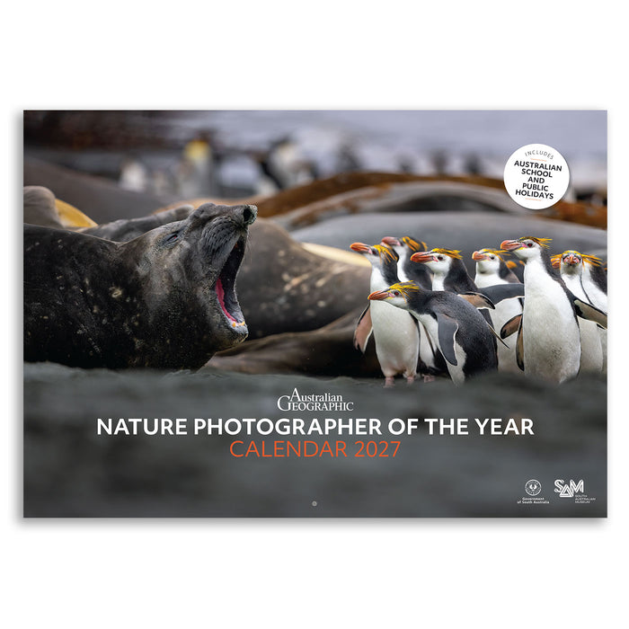 Australia Geographic Nature Photographer of the Year Calendar 2027, featuring a wildlife photograph of a seal and gentoo penguins on a white background.