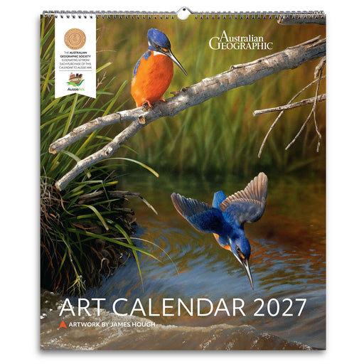 Australian Geographic Art Calendar 2027 featuring a detailed nature photograph of two kingfishers by James Hough. The cover shows one kingfisher perched on a branch and another diving into water, with the Australian Geographic logo and product title visible.