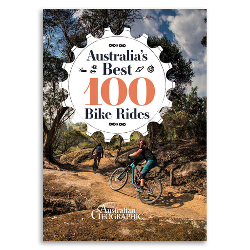 Book cover of 'Australia's Best 100 Bike Rides' by Australian Geographic with two cyclists on a trail.