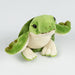 Green plush turtle toy on a light gray background