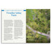 An open book or magazine page showing a travel article about Thredbo Valley Track. The left page has a blue header and white background with the title 'Thredbo Valley Track' and descriptive text.