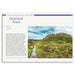 A printed travel guide or magazine page titled 'Overland Track' showing a scenic photograph of a mountain trail, with descriptive text on a white page and a purple header bar.