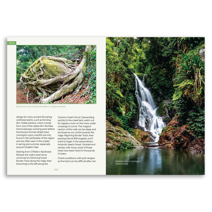 An open printed travel guide or magazine spread showing a large scenic photograph of a waterfall in a lush green forest on the right page, with text and a smaller inset map on the left page.