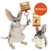Two plush bilby toys and a keychain with packaging on a white background