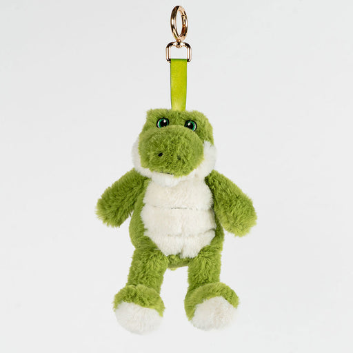 Green plush crocodile keychain on a white background