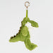 Green plush crocodile keychain on a white background