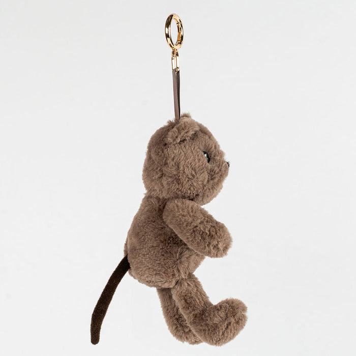 Plush quokka keychain on a light gray background