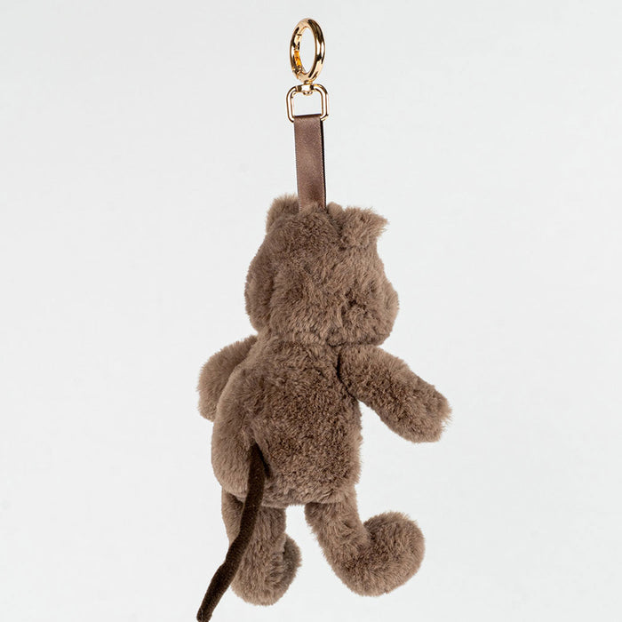 Brown quokka keychain on a light gray background