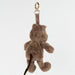 Brown quokka keychain on a light gray background
