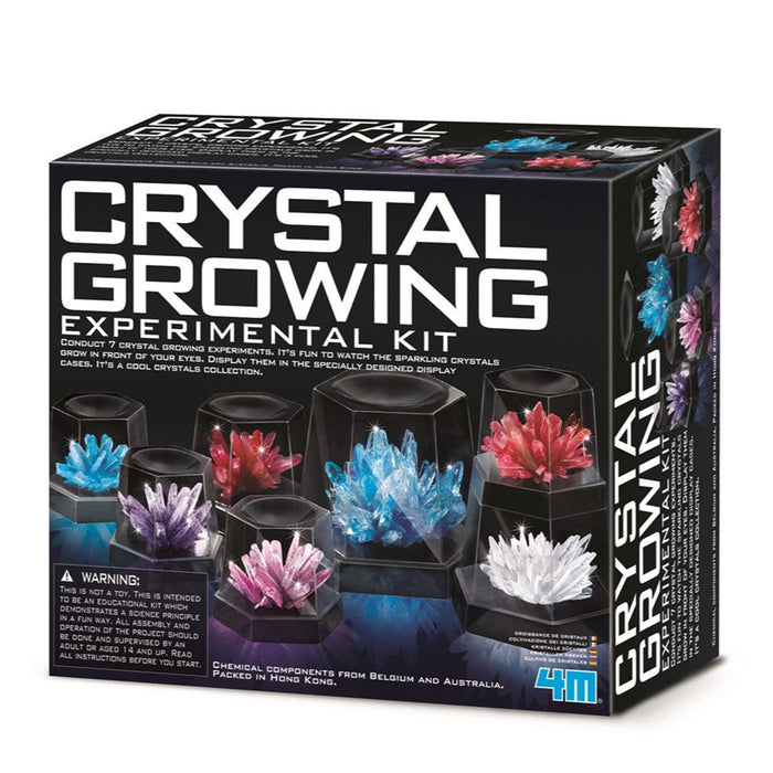 Box of a crystal growing experimental kit with colorful crystals on a white background
