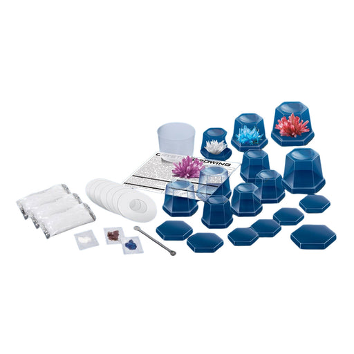 Set of blue and clear plastic cups with decorative items on a white background