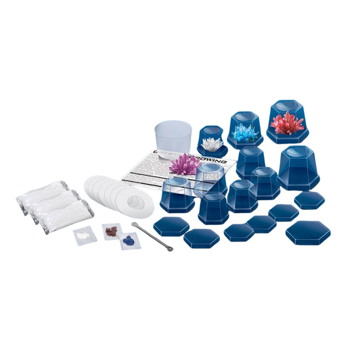 Set of blue and clear plastic cups with decorative items on a white background