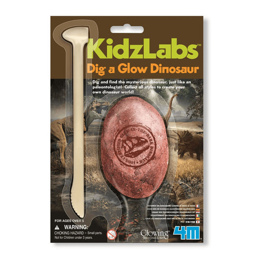 Packaging of KidzLabs Dig a Glow Dinosaur toy set with excavation tool and dinosaur egg.
