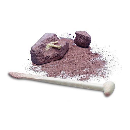 Pink sand with rocks and a wooden tool on a white background