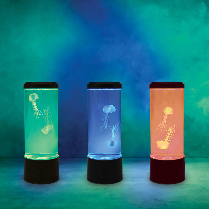 Three cylindrical lamps with jellyfish designs in green, blue, and orange on a gradient blue background.