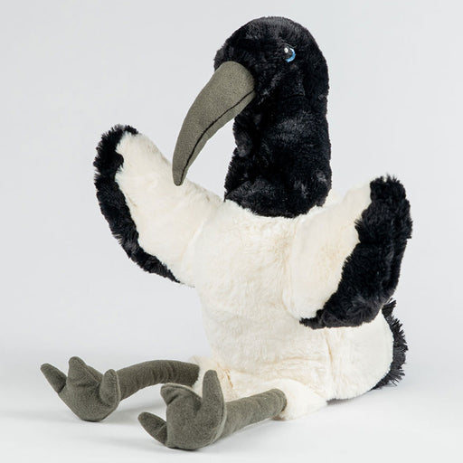 Plush toy ibis on a white background