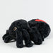 Black plush spider toy with a red spot on a white background
