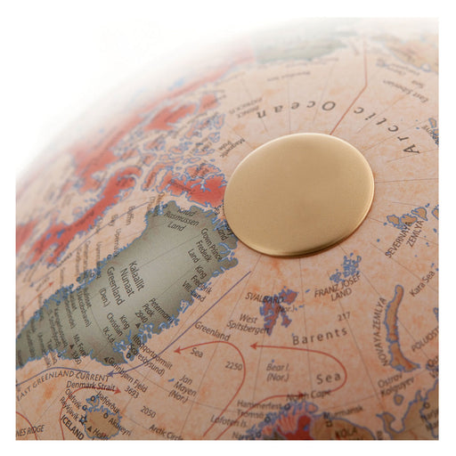 Globe with a gold disc on the North Pole
