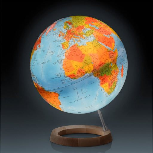 Globular world map on a stand with a dark background