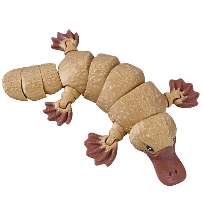 Toy figure of a platypus on a white background