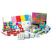 Assorted art supplies including paint, brushes, and a colorful painting on a white background