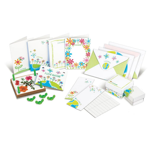 Set of stationery items with nature-themed designs on a white background