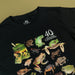 Black t-shirt with frog illustrations and 4o Australian Geographic logo on a beige background