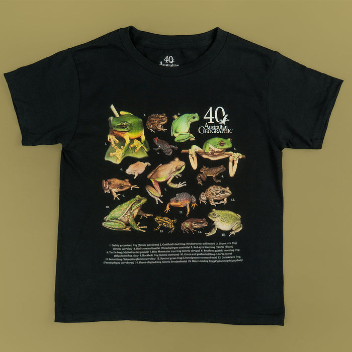 Black t-shirt with illustrations of frogs and Australian Geographic logo on a beige background