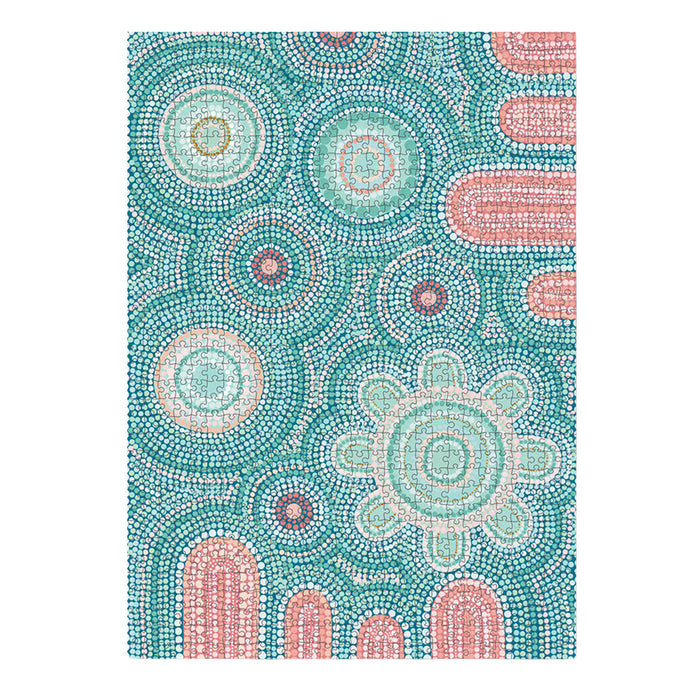 Colorful mosaic pattern with circular designs on a white background