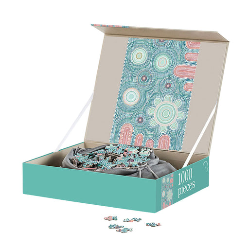 Jigsaw puzzle with 1000 pieces in a box featuring a colorful abstract design.