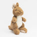A plush toy resembling a kangaroo with brown and beige fur, white belly, and small ears, sitting upright.