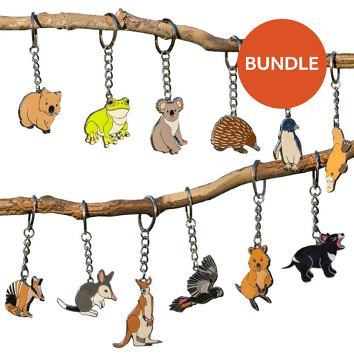 Set of animal-themed keychains hanging from a branch with a 'BUNDLE' label.
